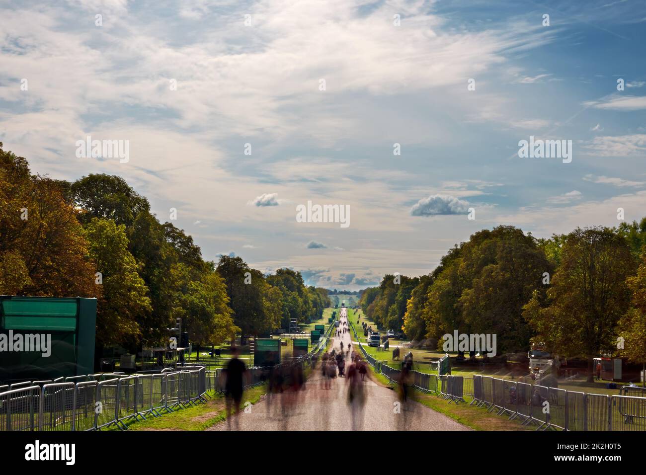 Daytime long exposure of people walking on The Long Walk in Great Windsor Park Stock Photo