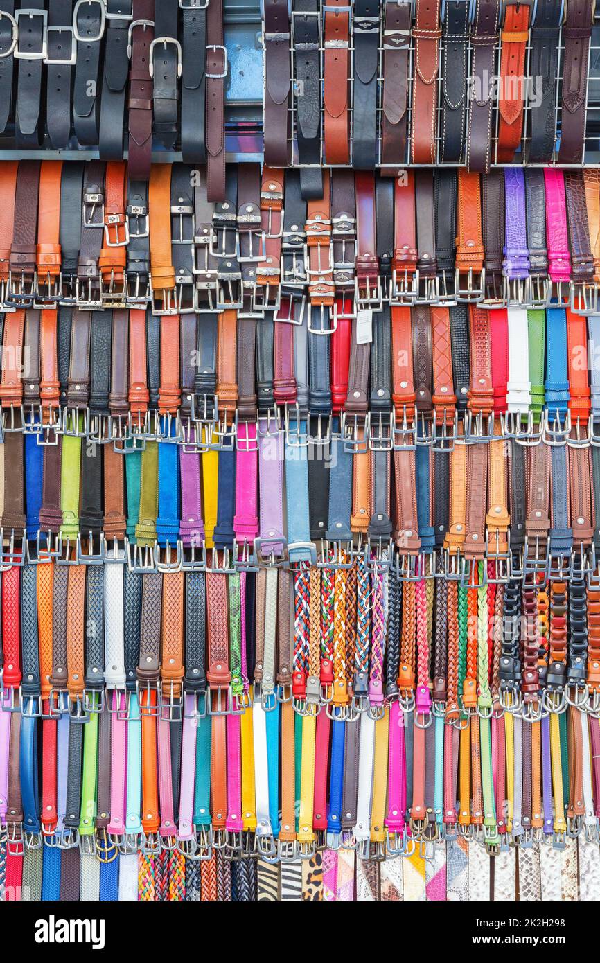 Colorful belts hanging for sale Stock Photo