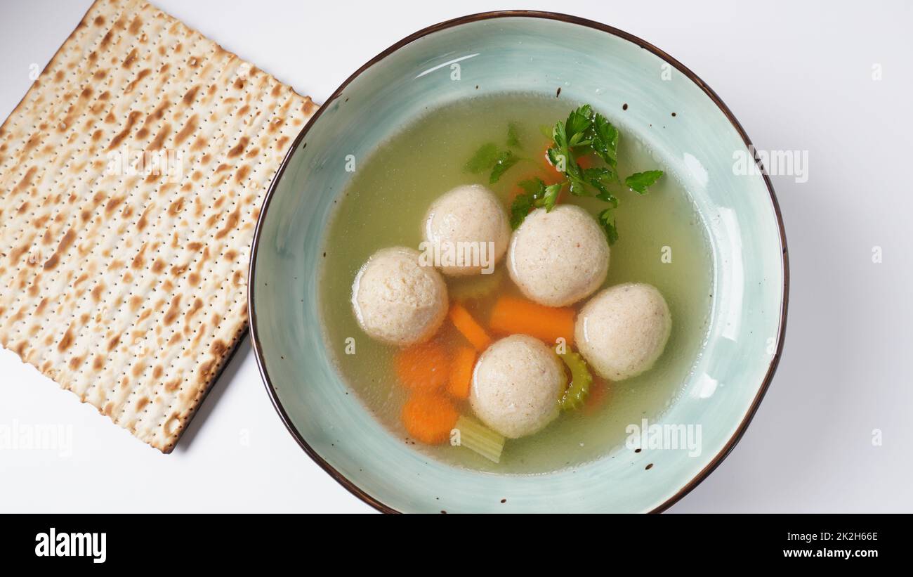 Jewish chicken broth with kneidlach (balls made with matzo meal)Matzo