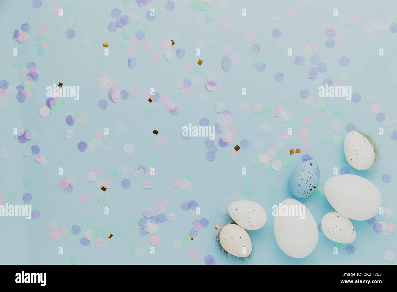 Happy Easter holiday, coming spring concept. Flat lay with branches, white eggs Stock Photo