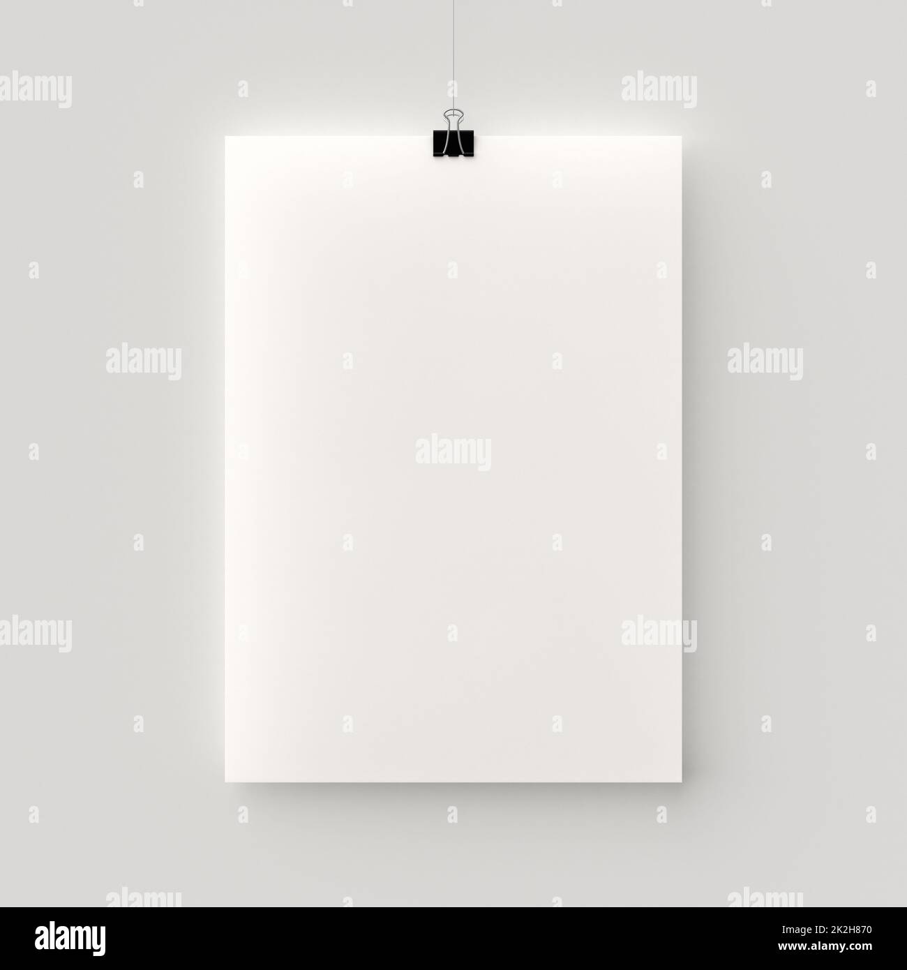 blank poster hanging by a thread Stock Photo