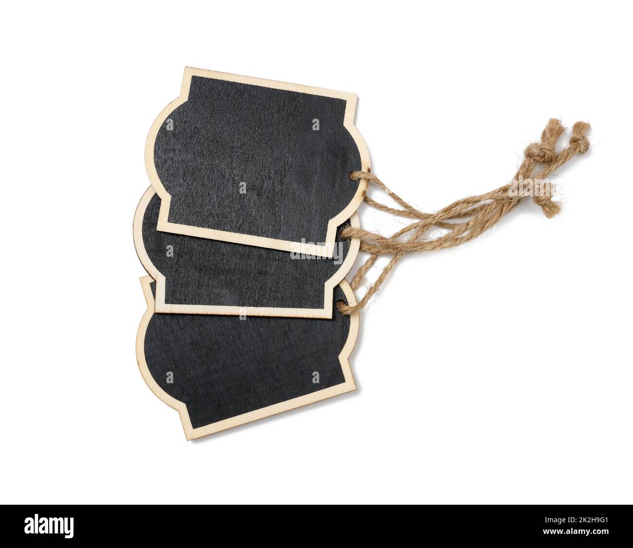 rectangular empty chalk plate on a brown rope. White isolated background Stock Photo