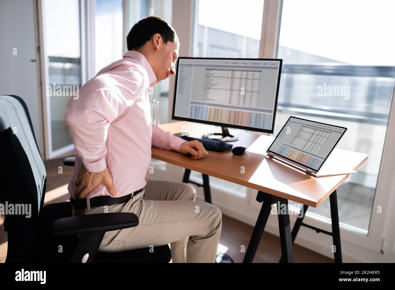 Bad Posture Office Desk Chair Back Stock Photo Alamy