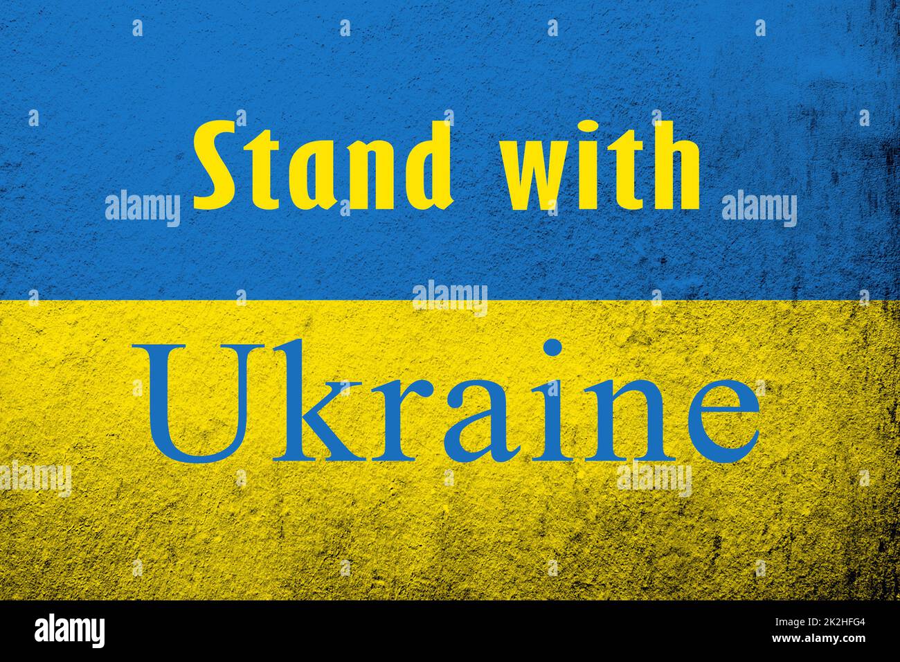 Stand with Ukaine color. .Ukrainian flag with a message against war. Grunge background Stock Photo