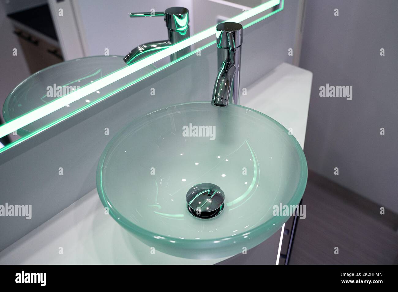 small bathroom glass sink inside luxury RV camper trailer Stock Photo