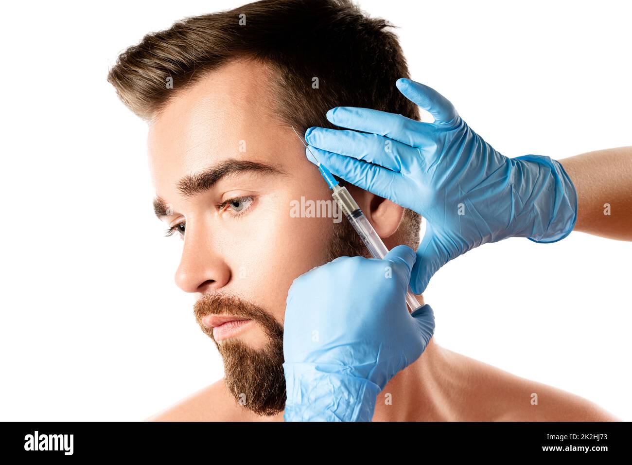 Man receiving scalp injection for hair grow Stock Photo