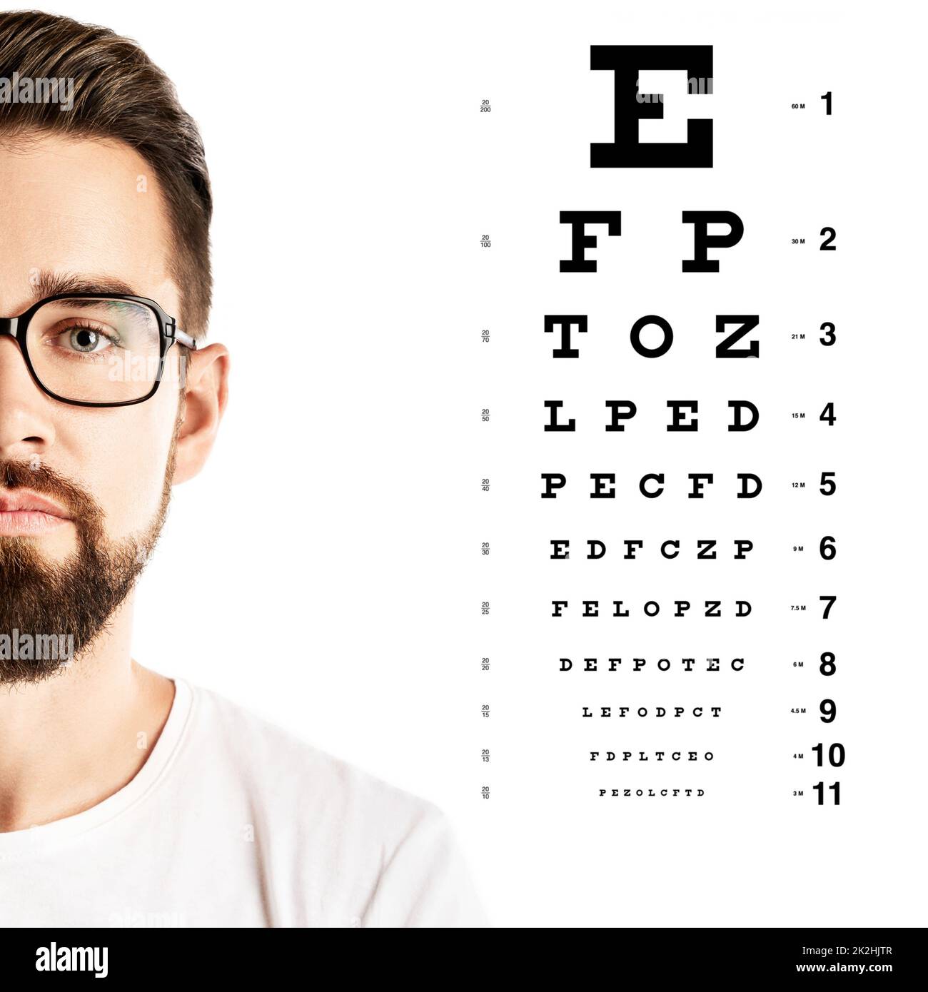 Man wearing eyeglasses and eye chart for visual acuity test Stock Photo