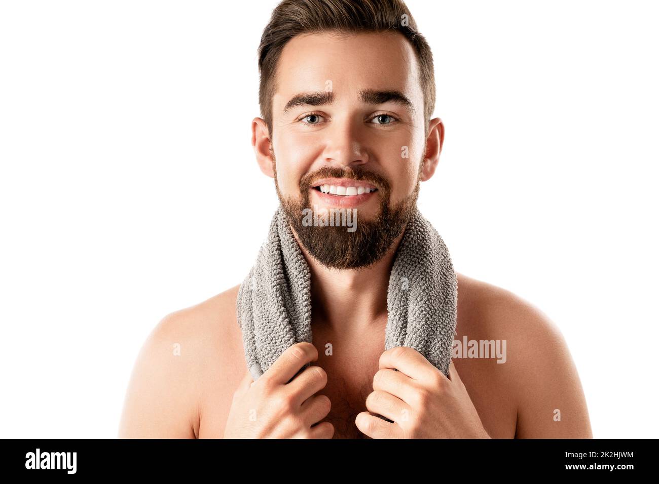 Young and handsome bearded man with smooth skin Stock Photo