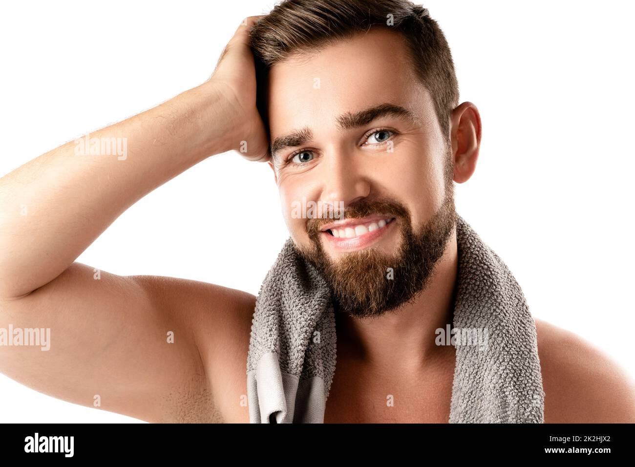 Young and handsome bearded man with smooth skin Stock Photo