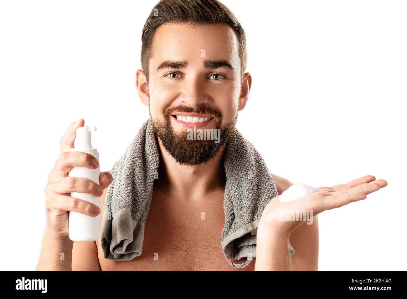 Handsome man with a cleansing or shaving foam Stock Photo