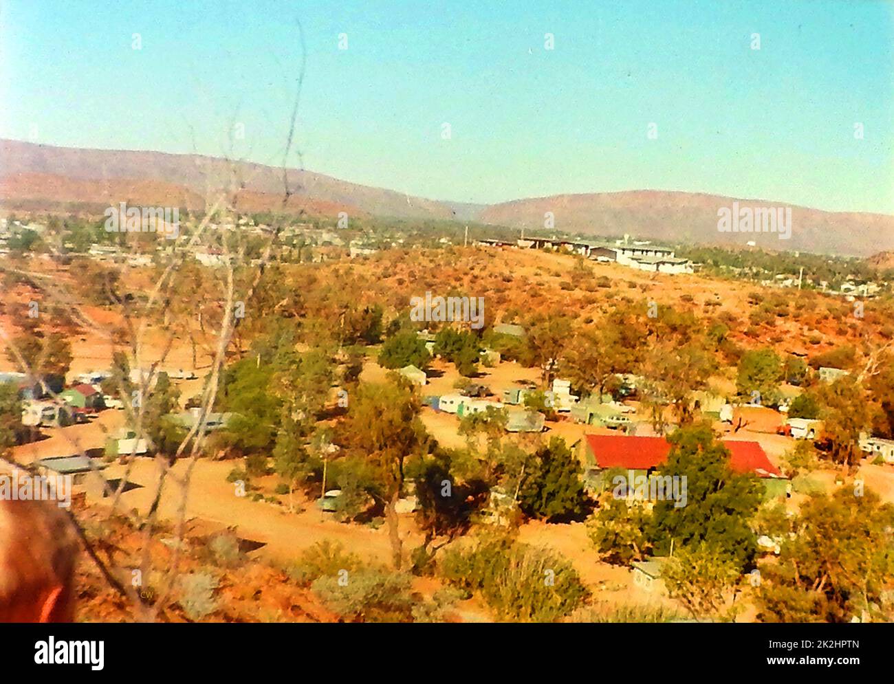 1972 Looking down on the former Greenleaves Caravan Park  and towards Alice Springs and Heavytree Gap (known as Ntaripe in the local Arrernte  Aborigine language), Northern Territory, Australia Stock Photo