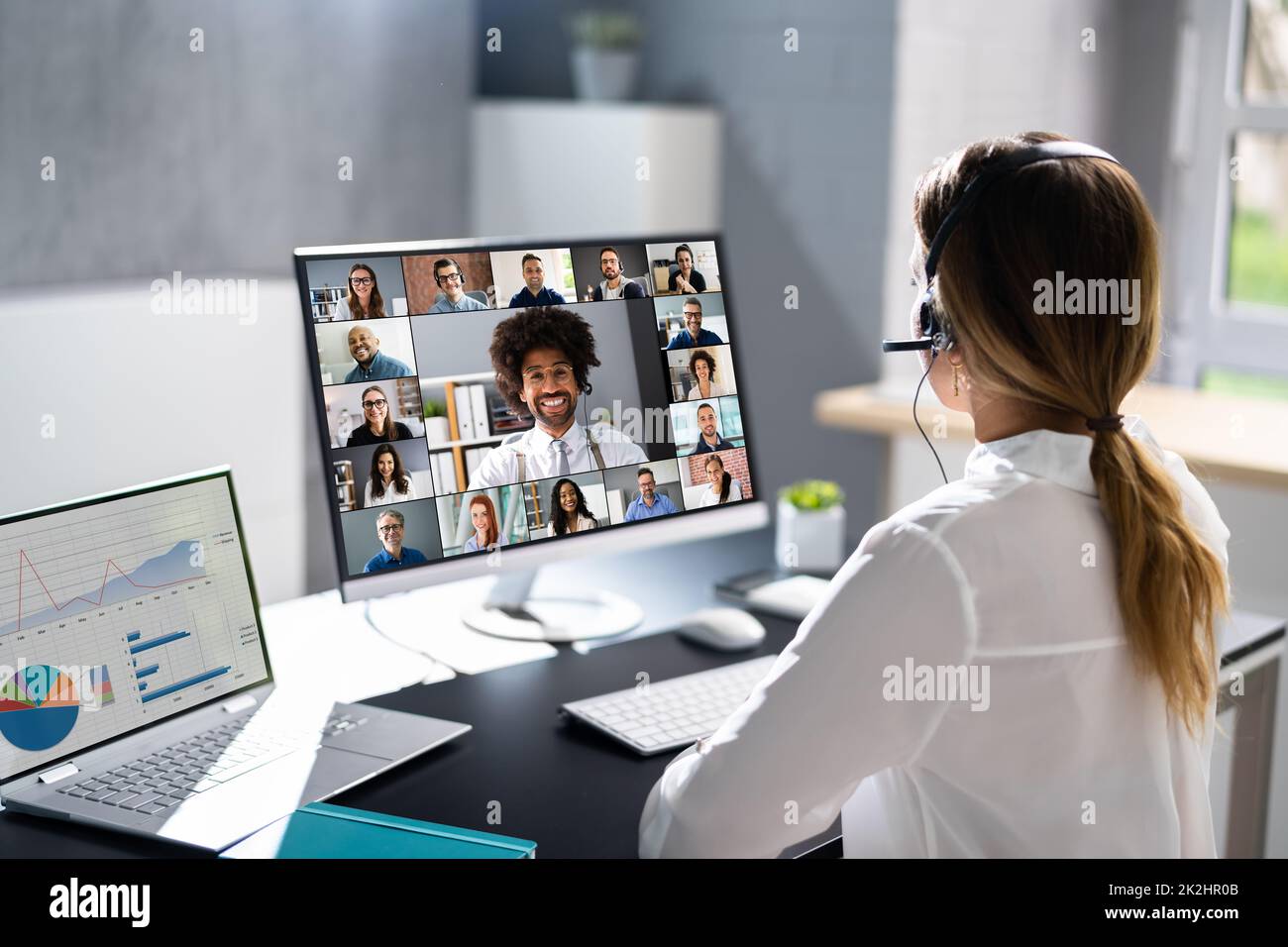 Online Video Conference Virtual Meeting On Multiple Screens Stock Photo