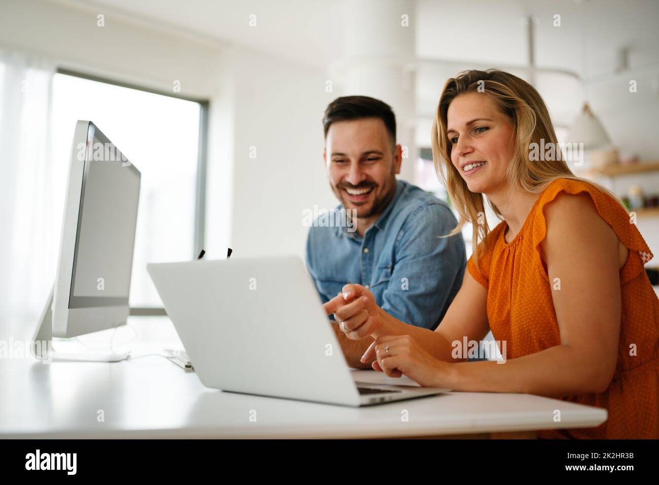Portrait of success business people working together in home office. Couple teamwork startup concept Stock Photo