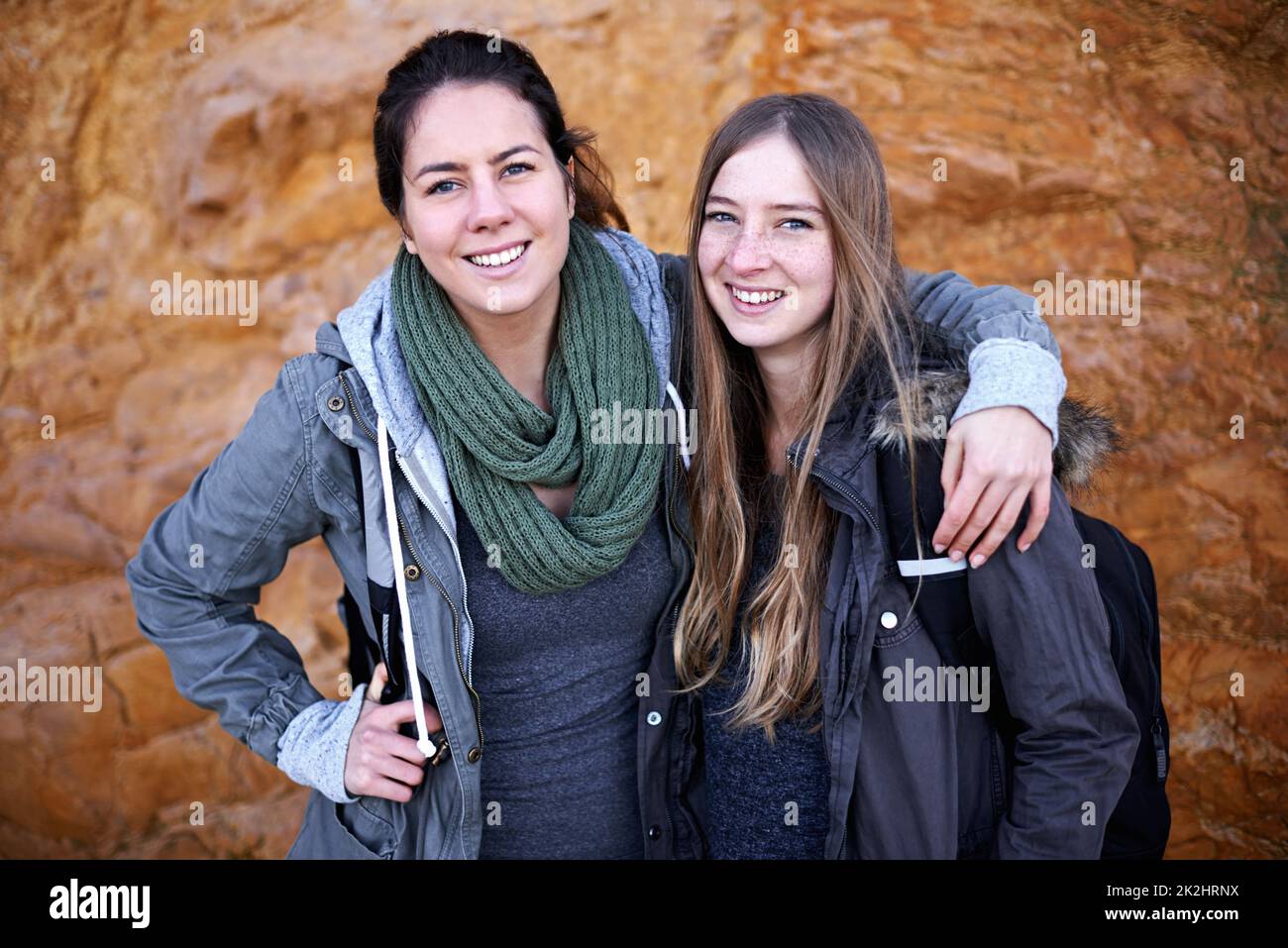 Hiking is their shared passion. Portrait of two attractive young female ...