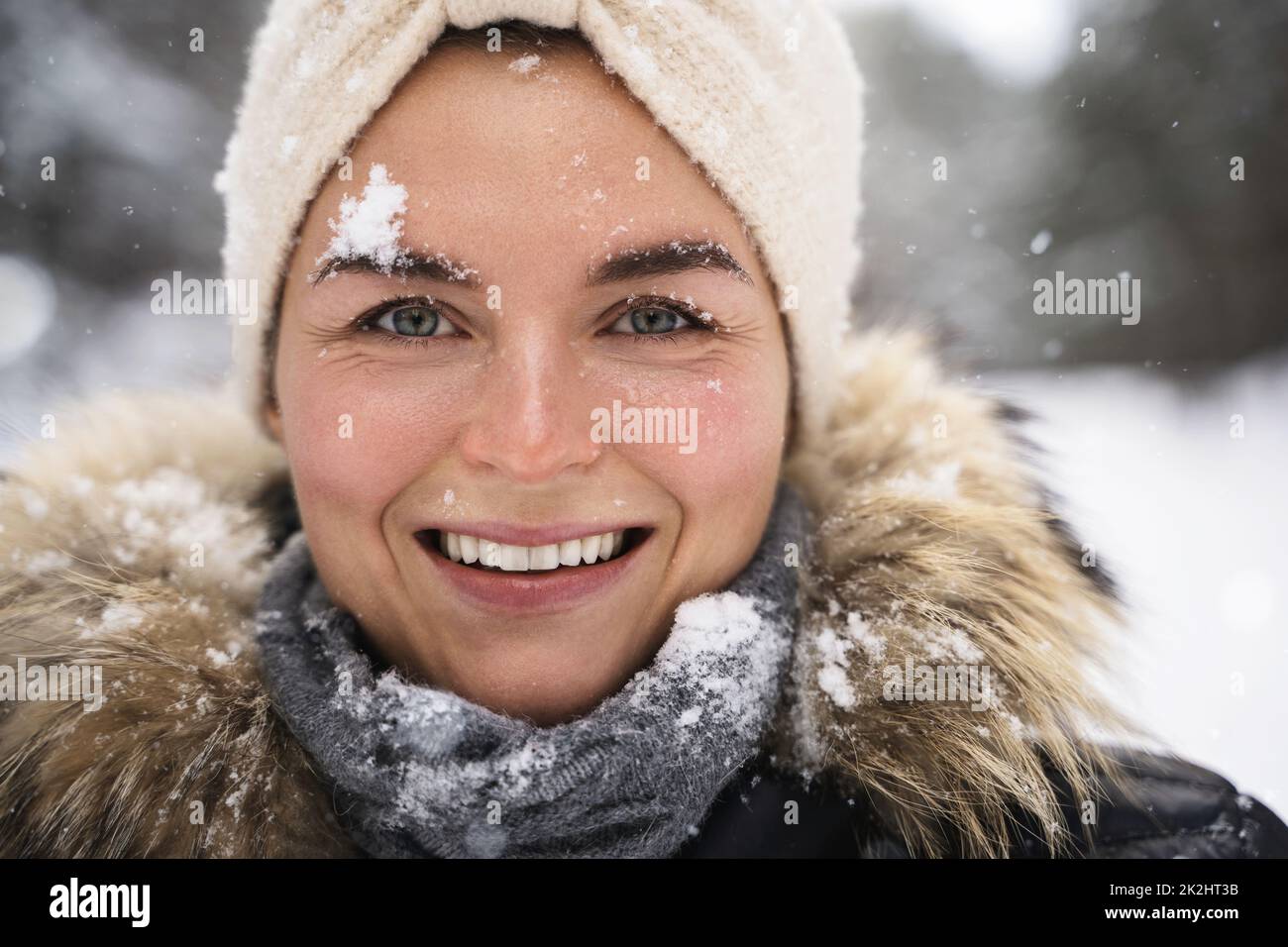 Beautiful Young Woman Enjoying In The Snow Stock Photo - Download