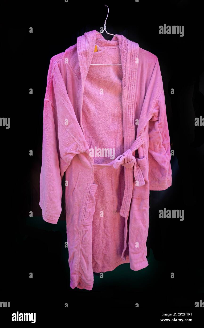 Pink Robe Hanging Pink cotton bathrobe on a hanger Stock Photo - Alamy