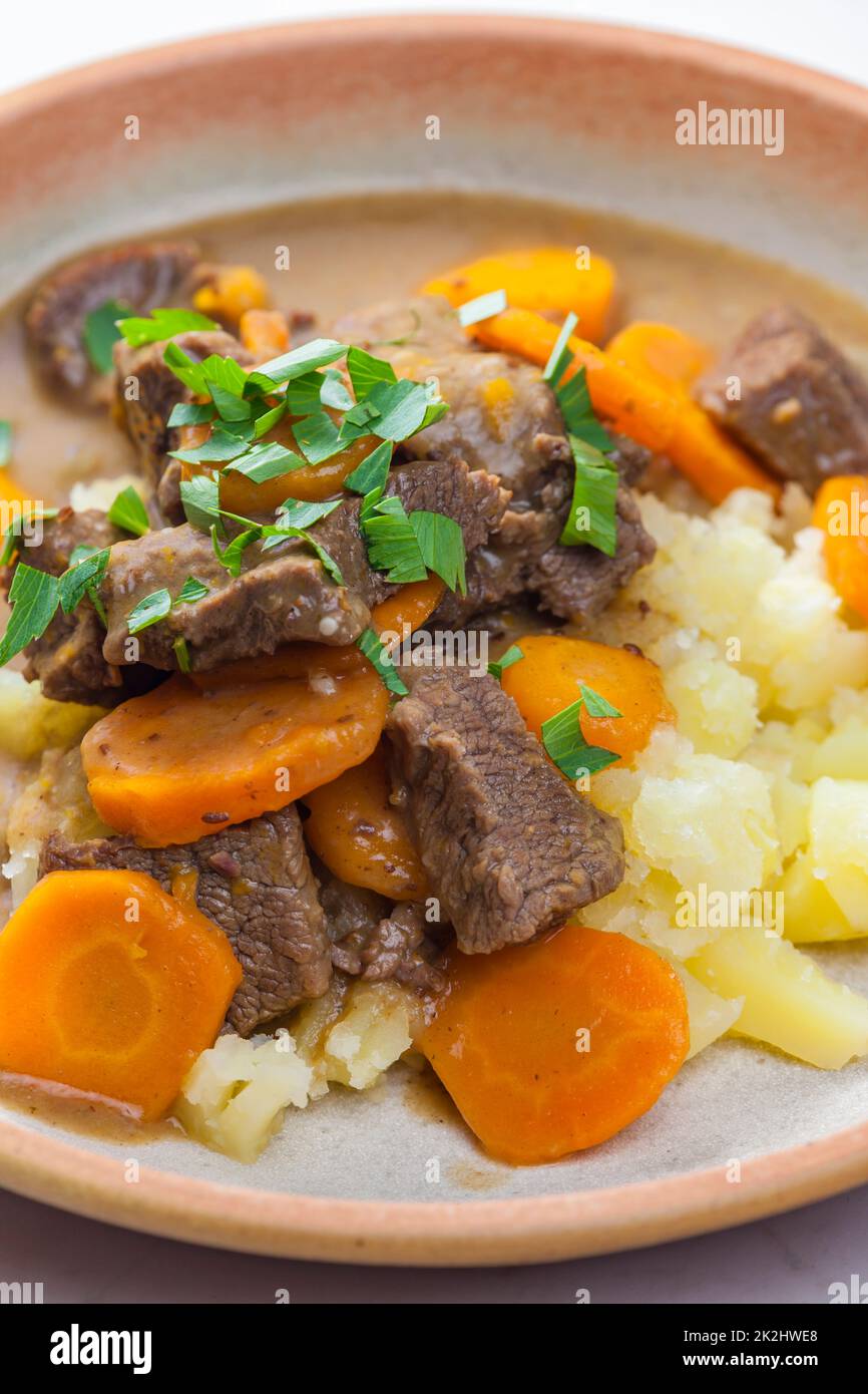 beef stew with carrot and mashed potatoes Stock Photo Alamy
