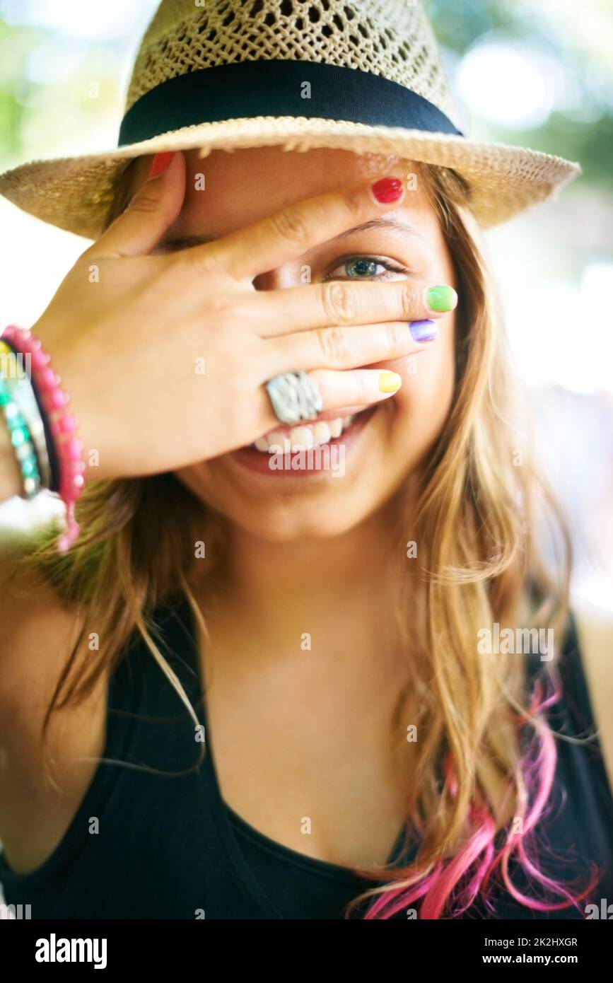 Why. A young woman wearing multicoloured nail polish Stock Photo Alamy