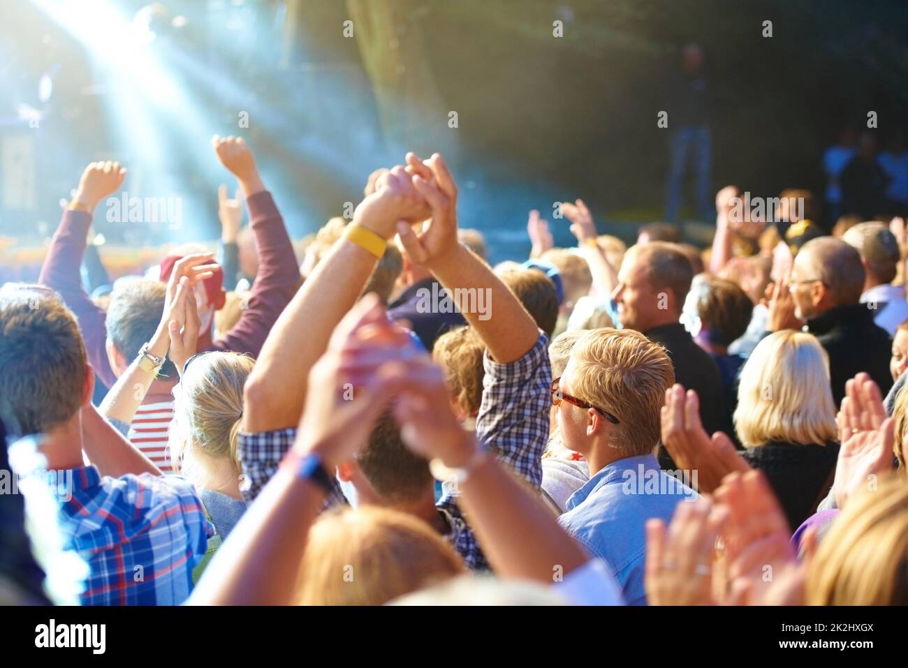 Enjoying the music festival. Cropped shot of a large crowd at a music concert. Stock Photo