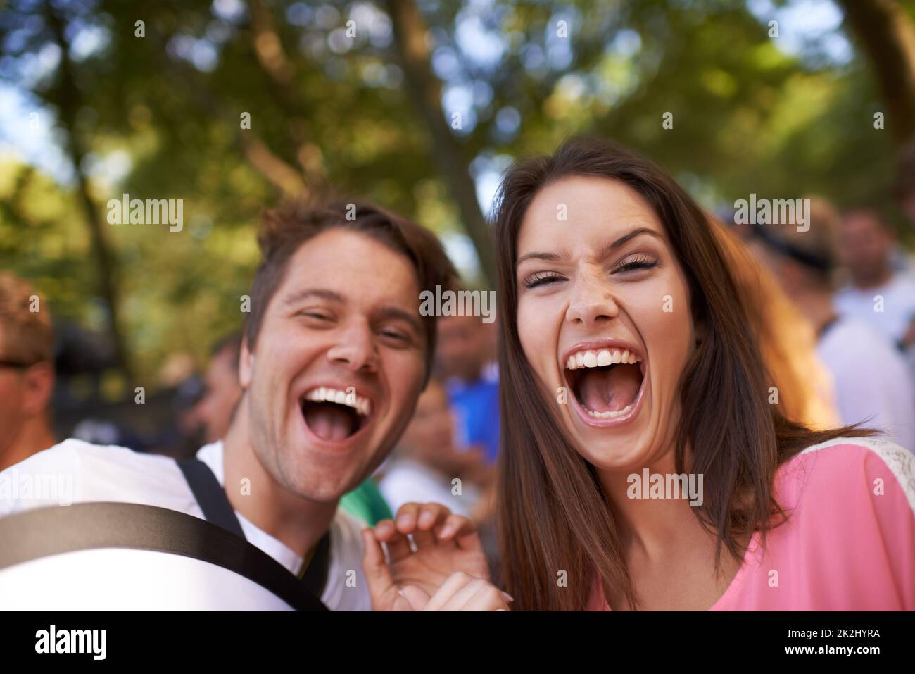 Skanderborg. Two friends screaming at the camera, having fun. Stock Photo