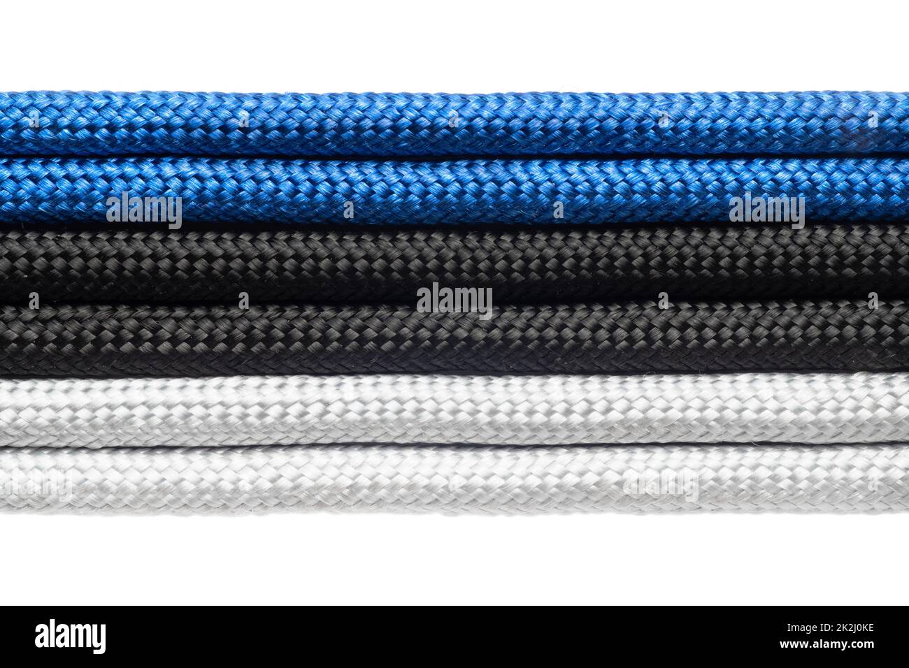 National flag of Estonia made from dyed braided cords isolated on white. Stock Photo