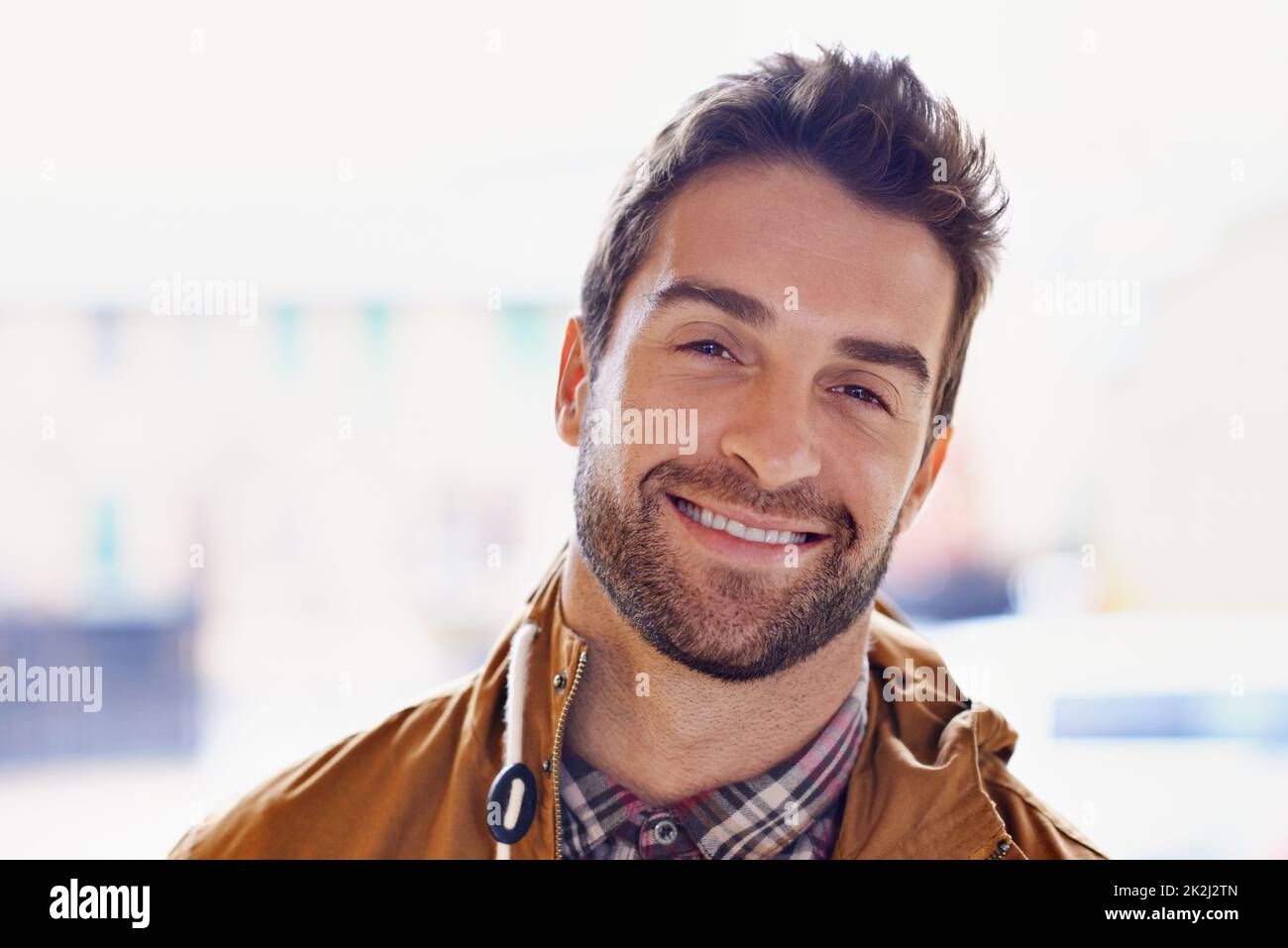 Casual and content. Cropped portrait of a handsome young man. Stock Photo