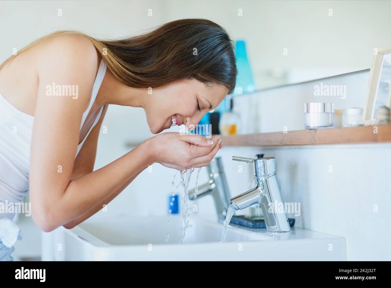 Regular cleansing for skin worth smiling about. Shot of young woman