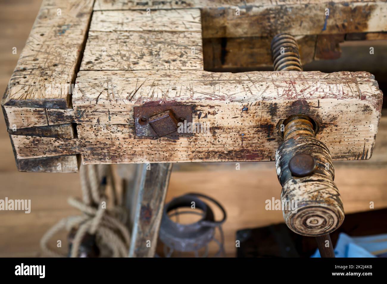 An old wooden workbench, workbench in a workshop. Stock Photo