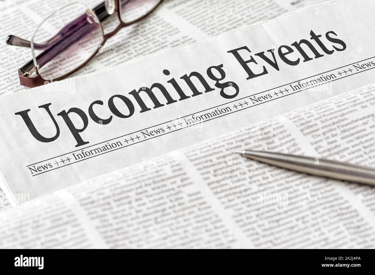 A newspaper with the headline Upcoming events Stock Photo