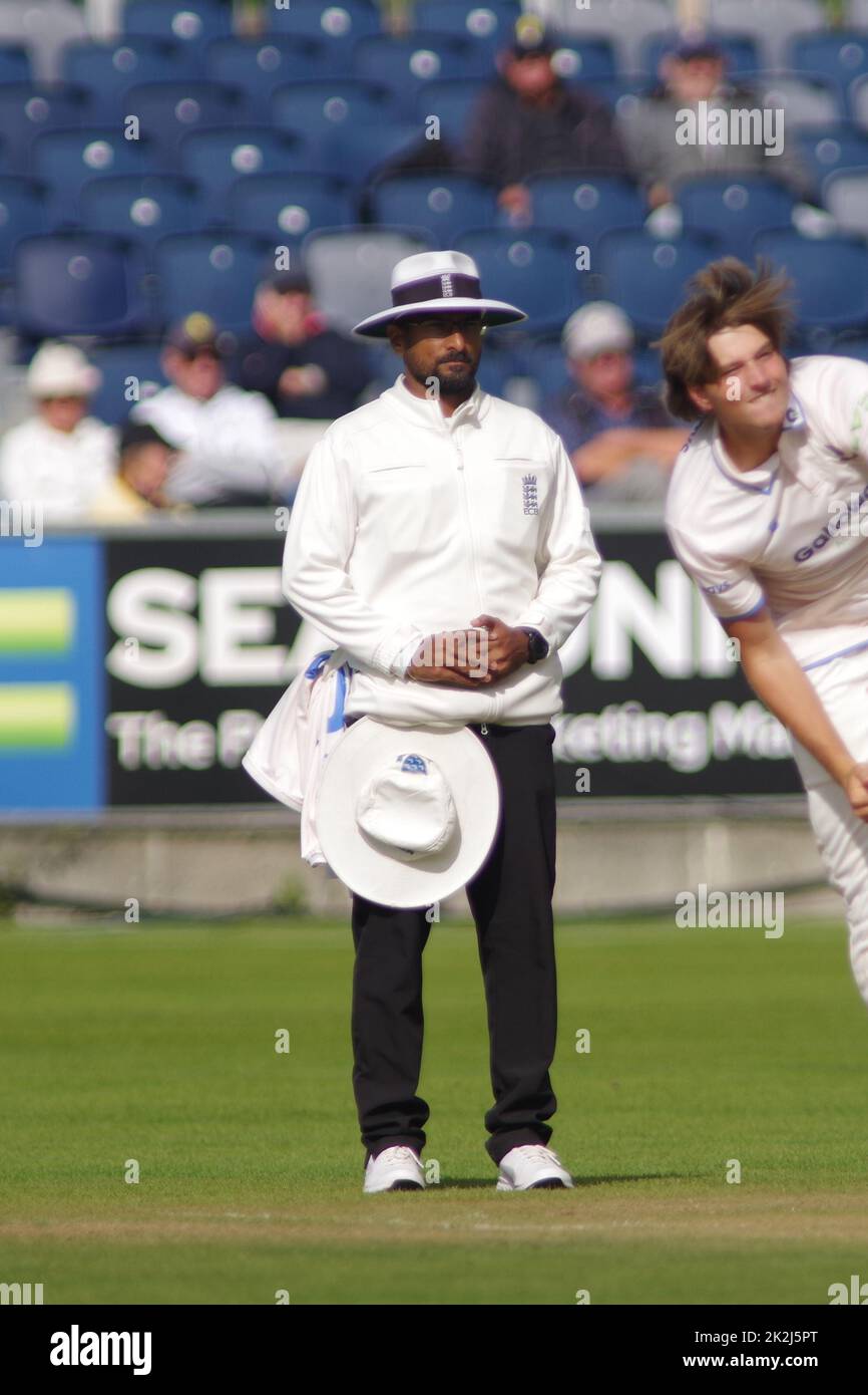 Chester le Street, England, 21 September 2022. Umpire Surendiran Shanmugam standing at the bowler's end in a County Championship match at the Seat Unique Riverside. Credit: Colin Edwards Stock Photo