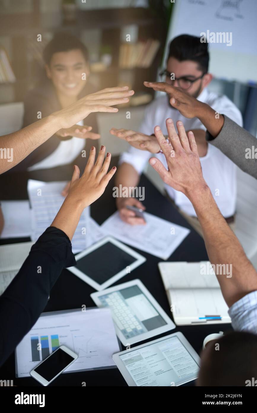 Group huddle hi-res stock photography and images - Alamy