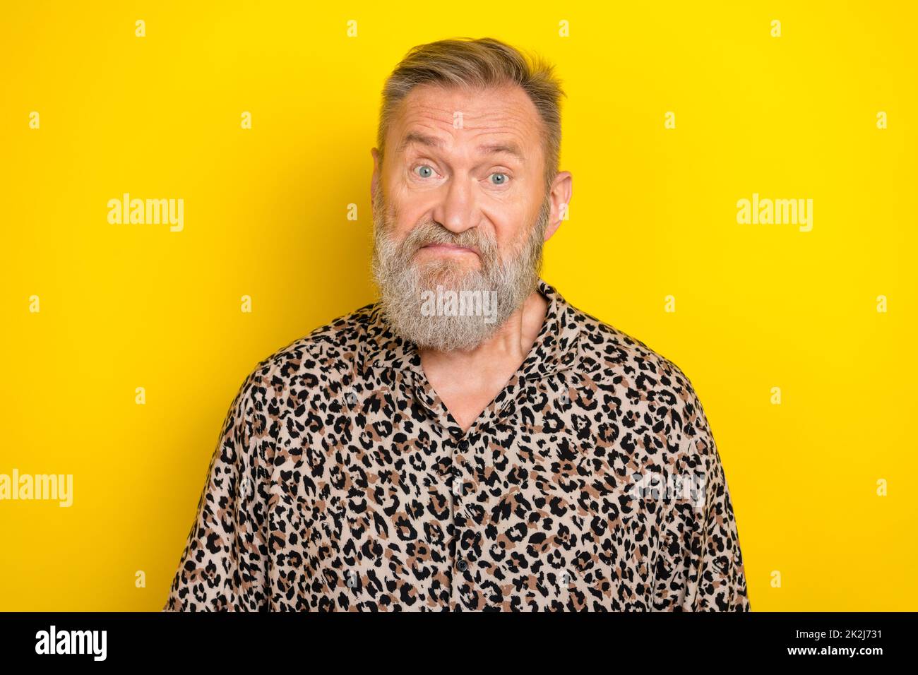 Photo portrait of handsome granddad sad bad news health problems dressed stylish leopard print garment isolated on yellow color background Stock Photo