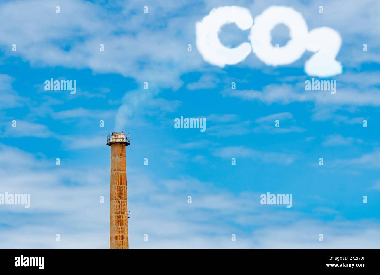 CO2 emissions. CO2 greenhouse gas emissions from factory chimney. Carbon dioxide gas global air climate pollution. Carbon dioxide in earths atmosphere. Greenhouse gas. Smoke emissions from chimney. Stock Photo
