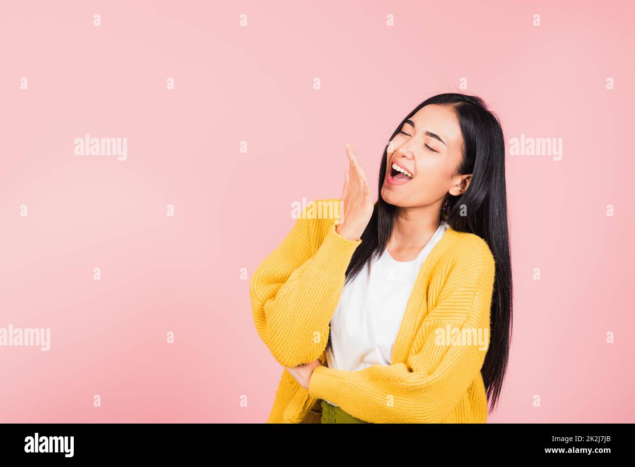 woman standing winning and surprised excited screaming laugh Stock Photo