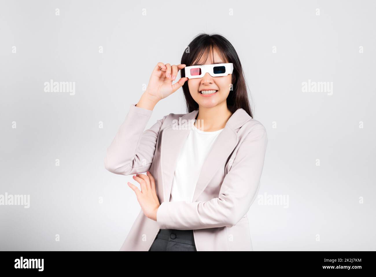 Smiling woman confidence wearing 3d cinema movie glasses Stock Photo