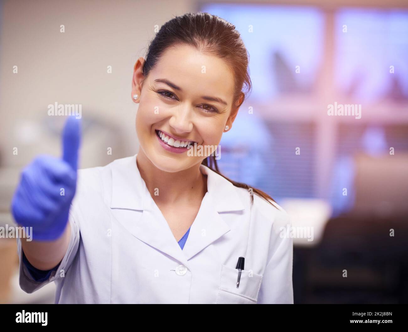 Ive just reached a major medical breakthrough. Portrait of a confident young scientist showing a thumbs up gesture in a laboratory. Stock Photo