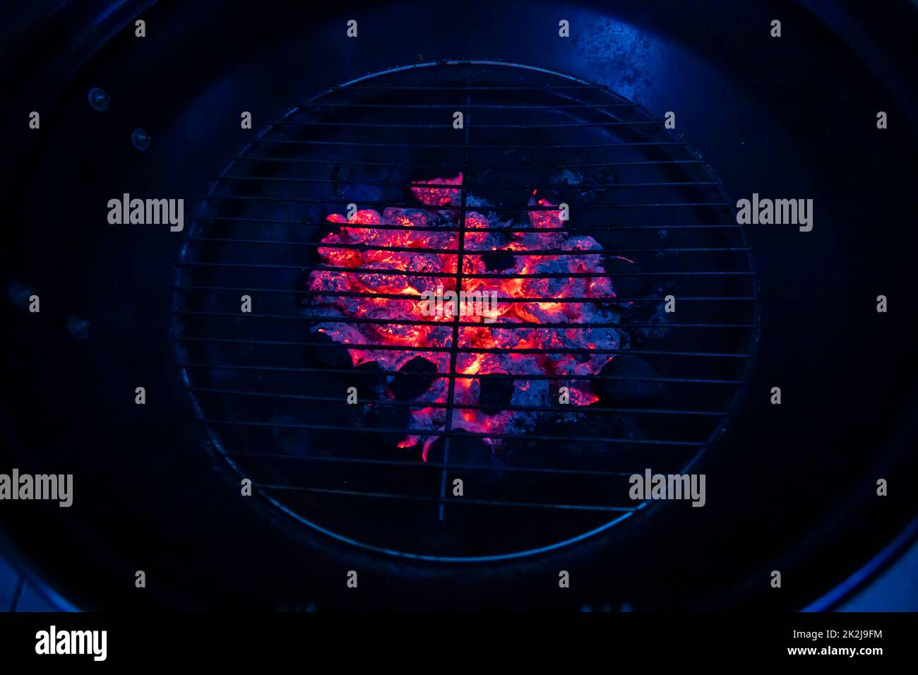 close up of burning coals on grill Stock Photo - Alamy