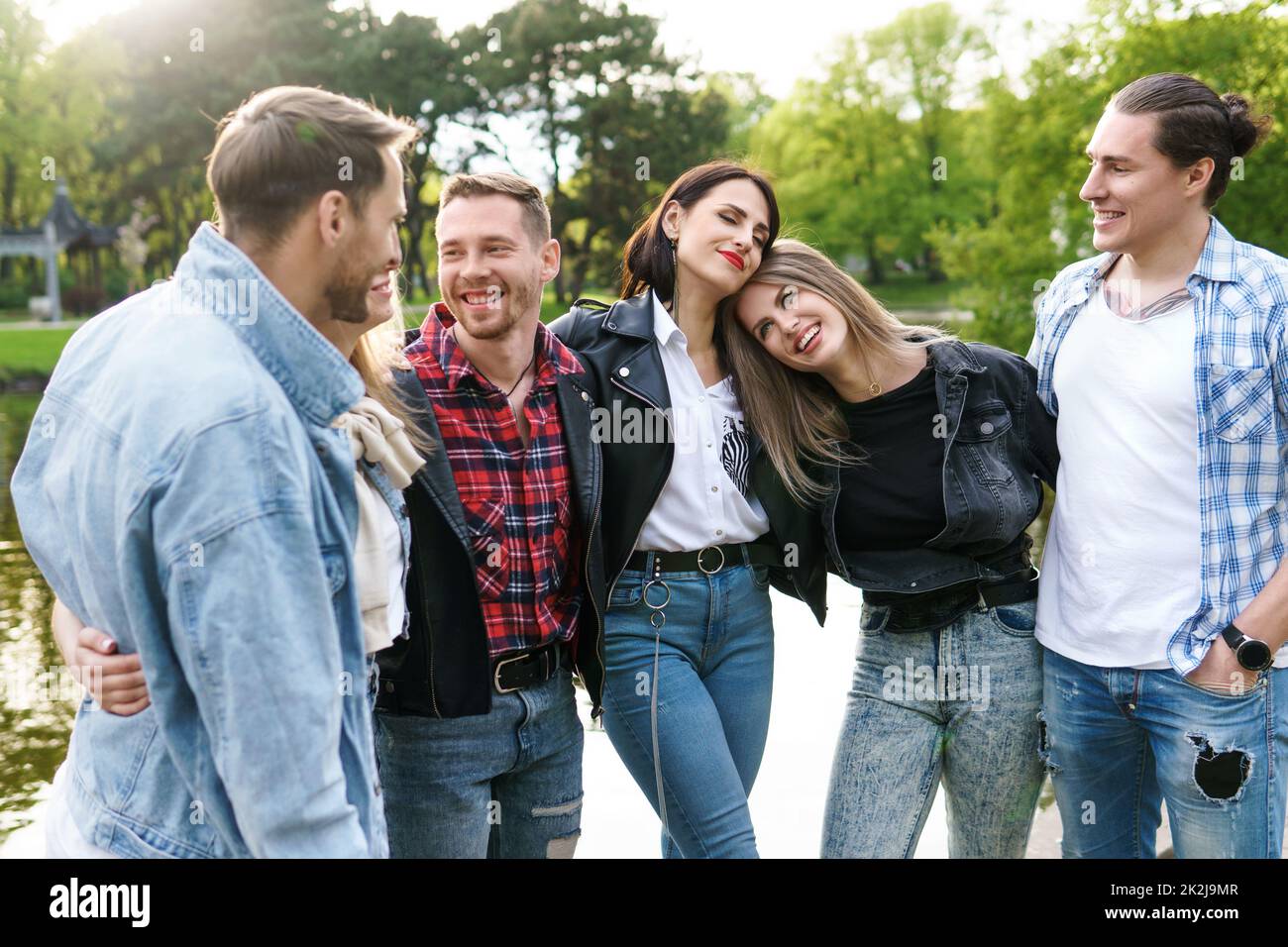 Group of best friends are having fun in a city park Stock Photo