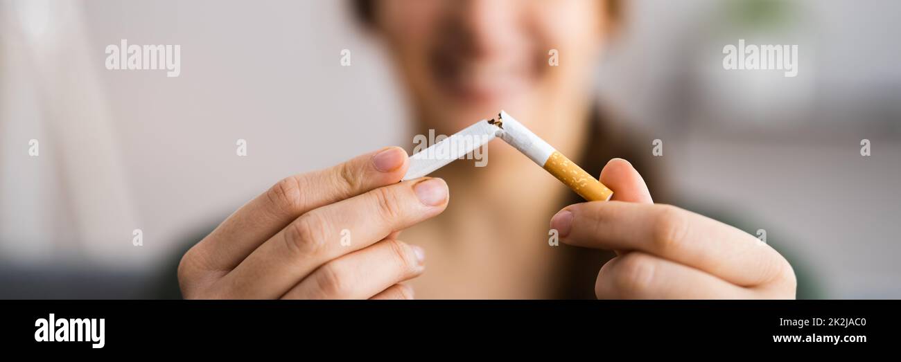 Quit Smoking Broken Cigarette. Addiction Stock Photo