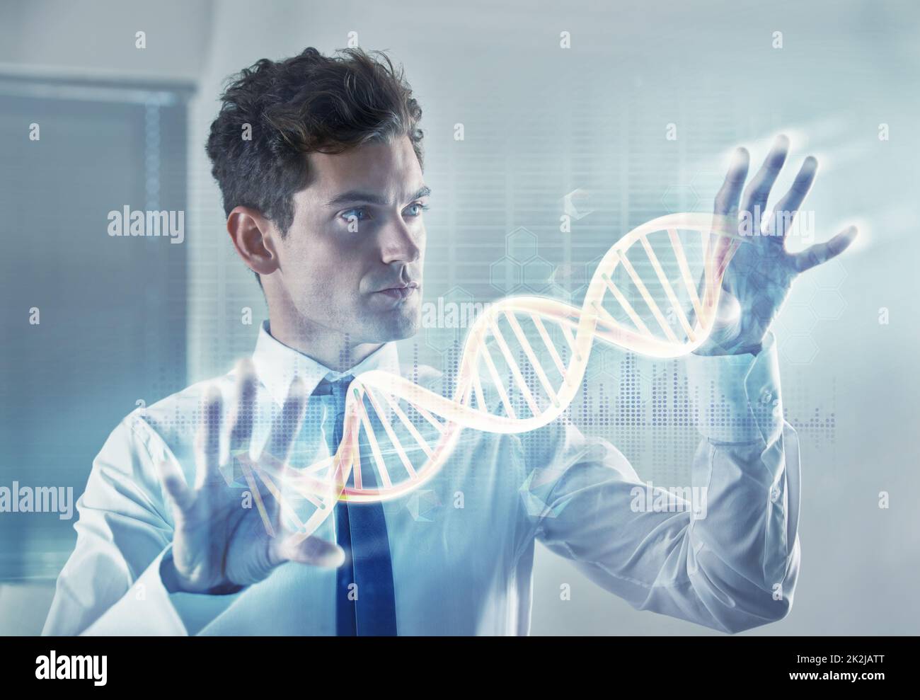 Shot of a young businessman using a cgi digital interface- ALL screen content on this image is created from scratch by Yuri Arcurs team of professionals for this particular photo shoot - this is an alternative version of iStock file 44832818 Stock Photo