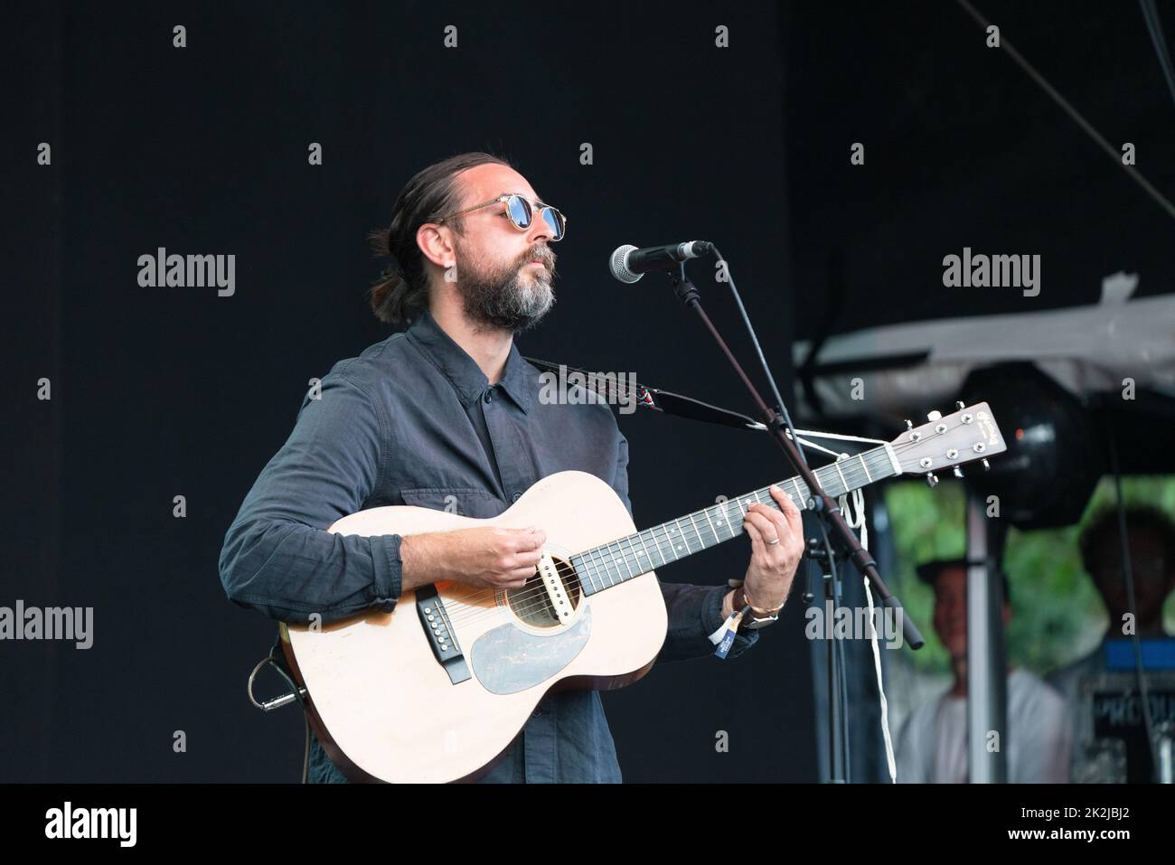 Charles Watson plays the Walled Garden Stage on Day Three of the Green Man 2022 music festival in the Brecon Beacons Mountains in Wales, UK, August 20 Stock Photo