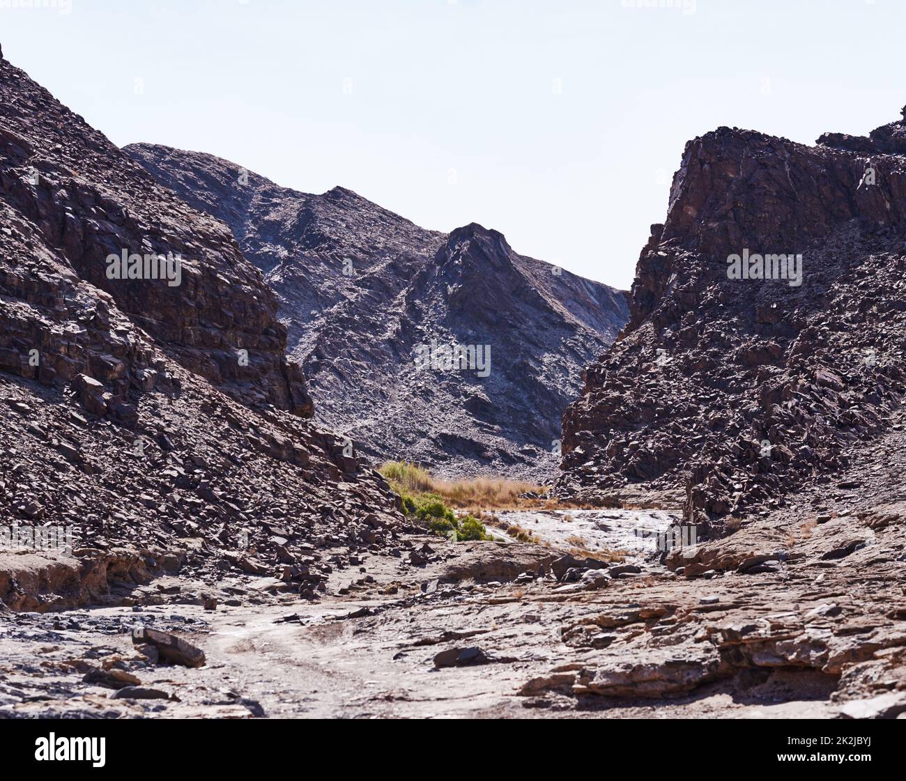 Take the road less traveled. Shot of rugged desert terrain. Stock Photo