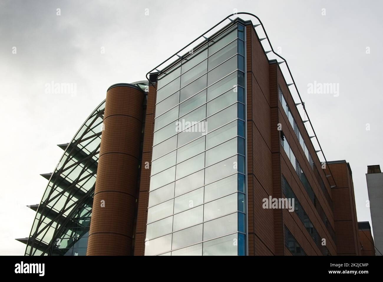 London, United Kingdom - November 25th, 2006: Architecture on modern east wing of St Thomas' Hospital (reconstructed in 1950s) with gray overcast sky in background. Stock Photo