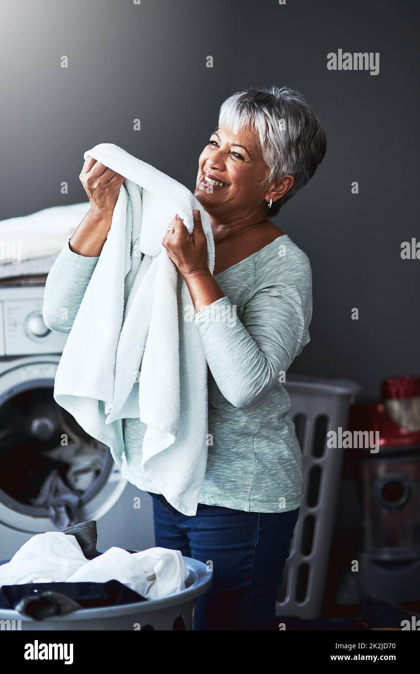 Clean Towels Laundry And Woman Doing Washing While Working For