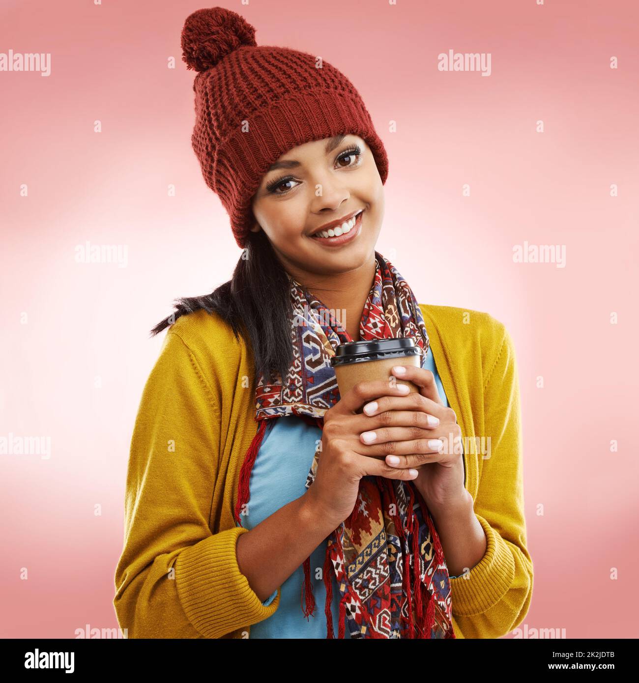 Keep warm this winter. Cropped portrait of a young woman posing in winter wear. Stock Photo