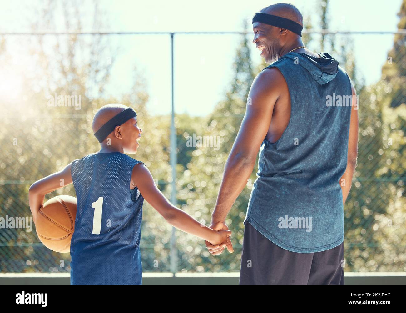 Basketball, family and sport with a dad and son training on a court