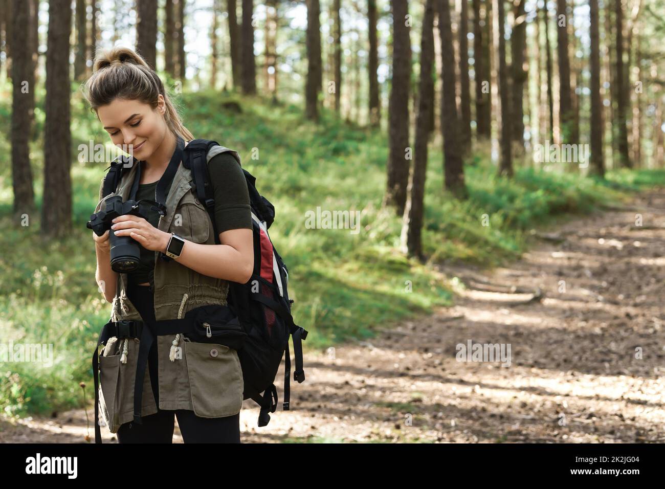 Woman hiker in green hi-res stock photography and images - Alamy