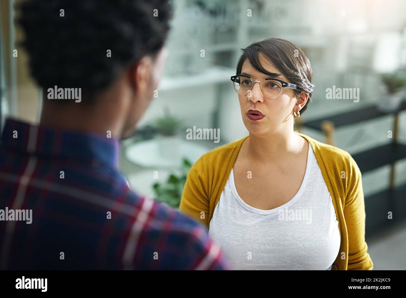 Creative differences can make tempers flare in any office. Shot of two designers having a disagreement in the office. Stock Photo