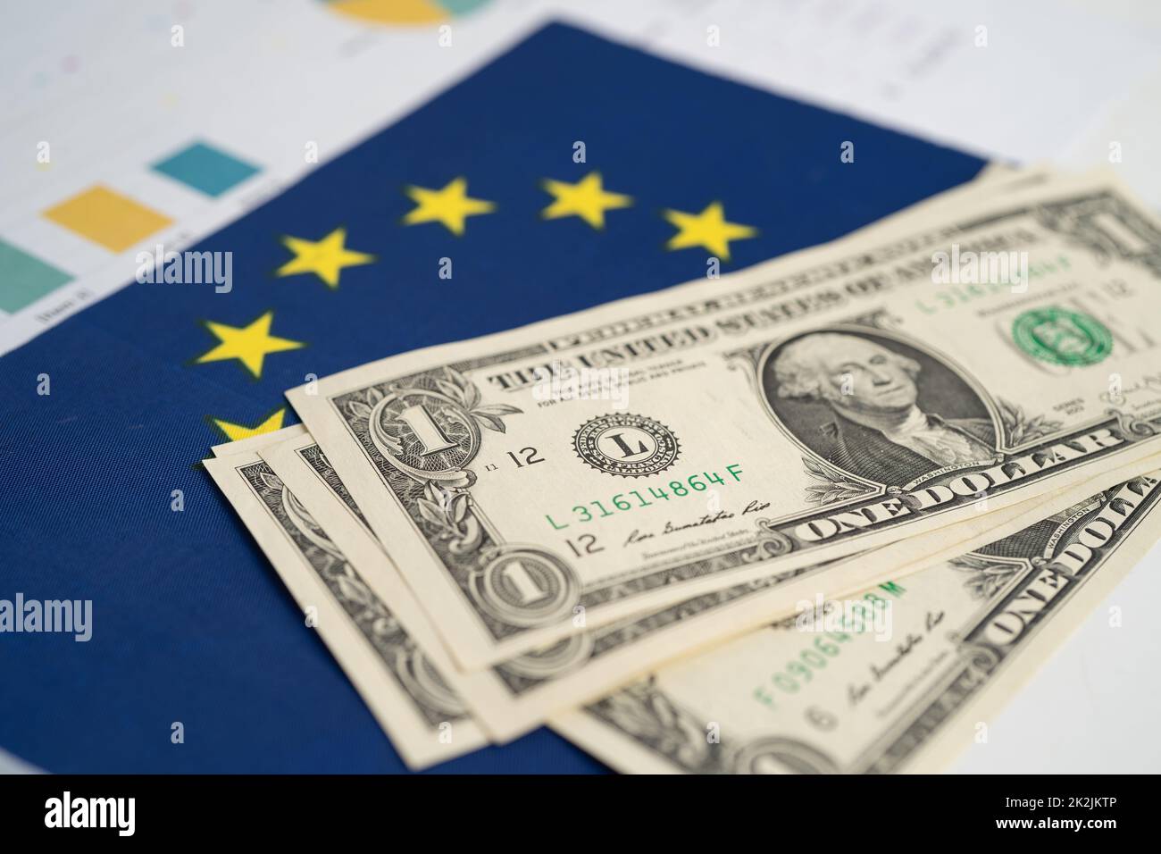 US dollar banknotes money on EU flag in europe , Business and finance concept. Stock Photo