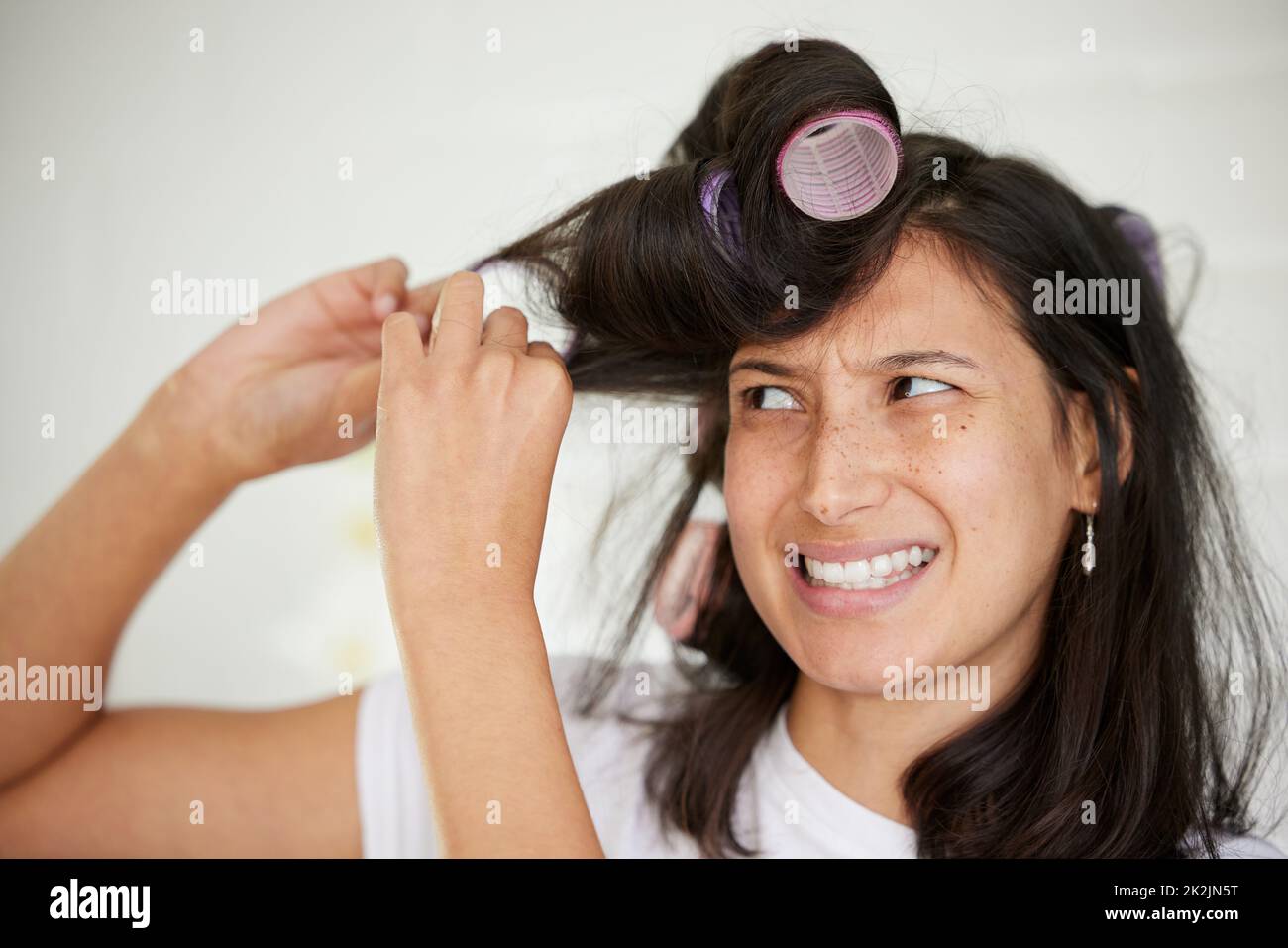 Woman rollers hair hi-res stock photography and images - Alamy